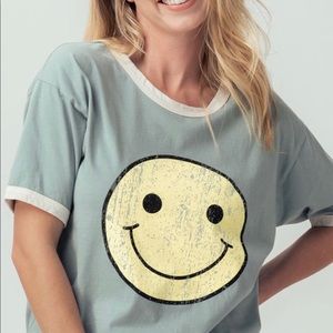 Smiley face T-shirt - new with tags. I have 2 size S, 2 size M, 1 size L